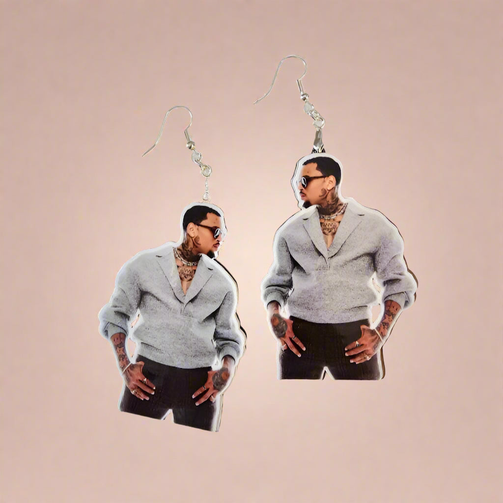 Chris Brown portrait dangle earrings featuring artist in gray sweater and sunglasses
