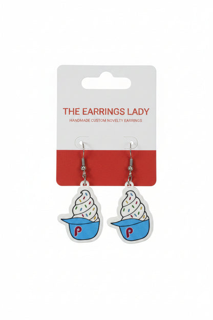 Ice cream cone earrings on a 'The Earrings Lady' card against a carpeted background
