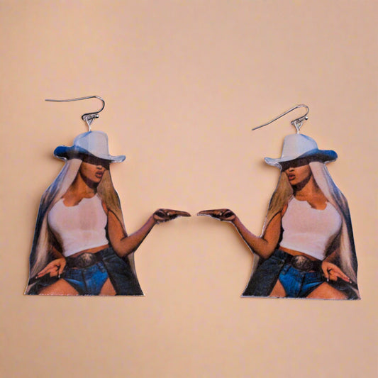 Beyoncé Cowboy Carter-inspired earrings featuring a silhouette of Beyoncé in a cowboy hat, displayed on a branded card reading "The Earrings Lady Unique Handmade Earrings.