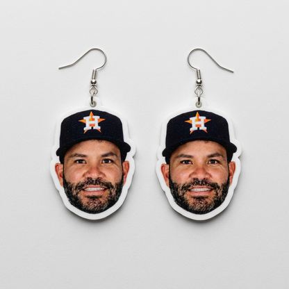 Earrings with a sports team logo on a plain background Jose Altuve