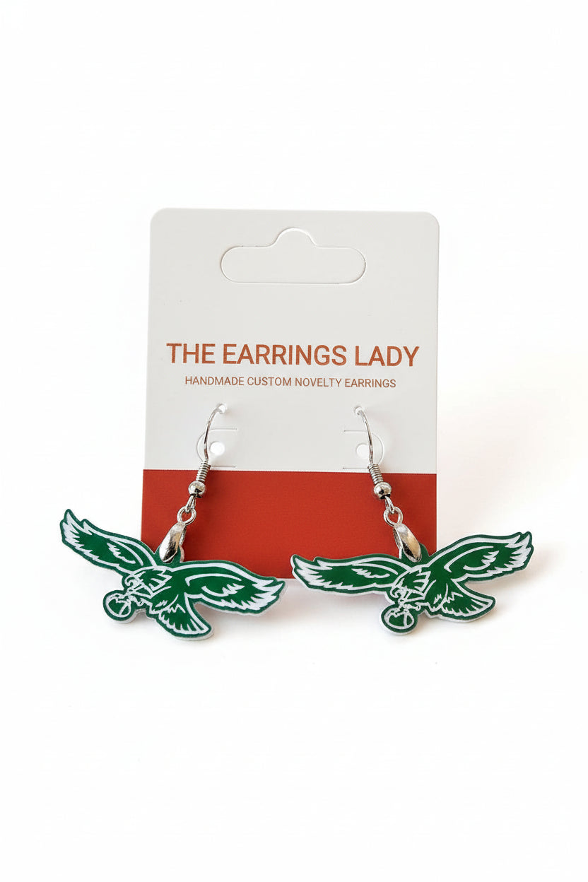 Green and silver bird-shaped earrings on a 'The Earrings Lady' branded card.