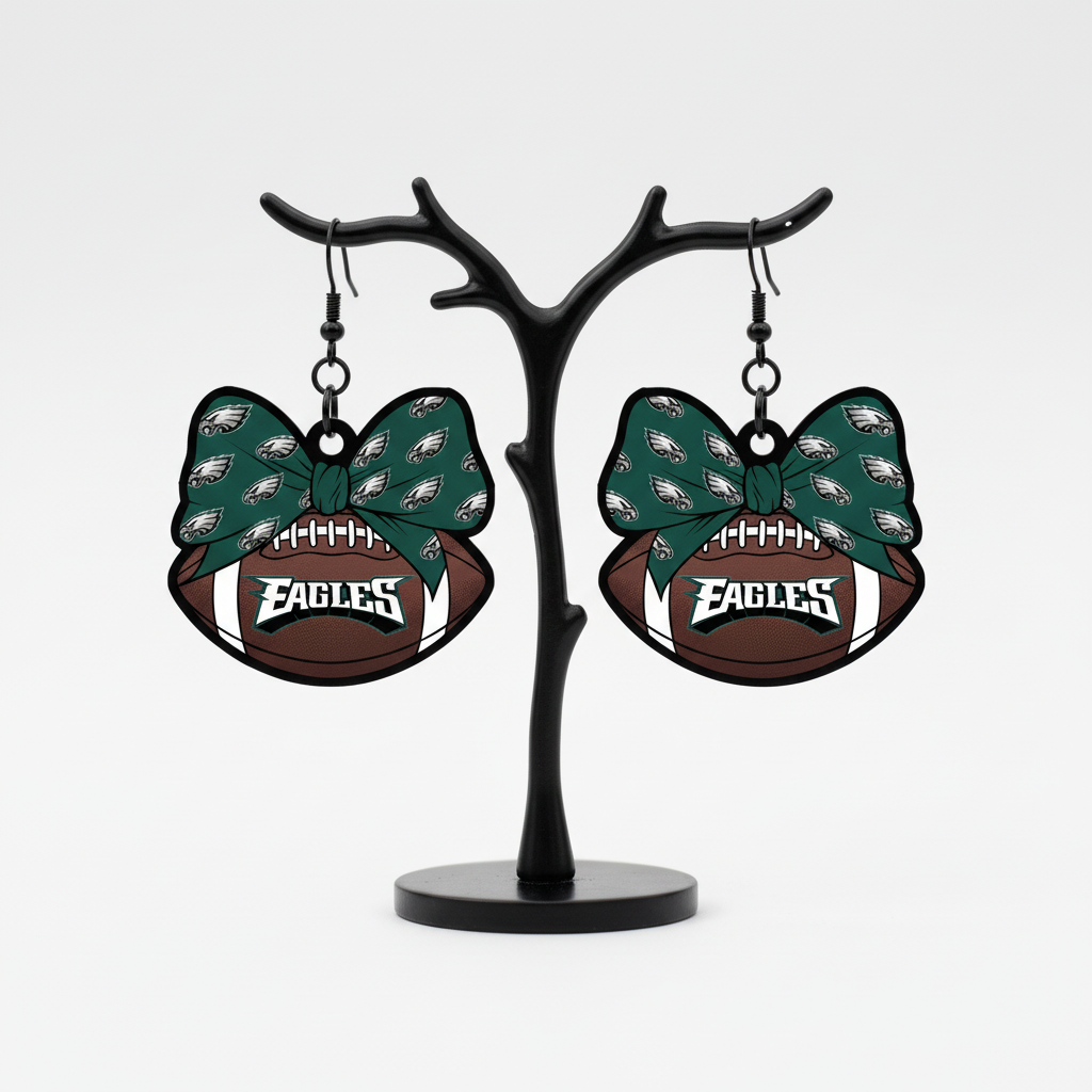 Philadelphia Eagles bow football dangle earrings.