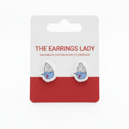 Earrings on a 'The Earrings Lady' branded card on a textured surface