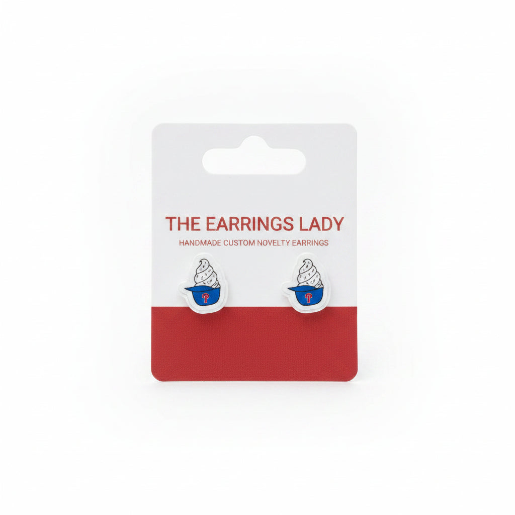 Earring card with earrings on a textured surface