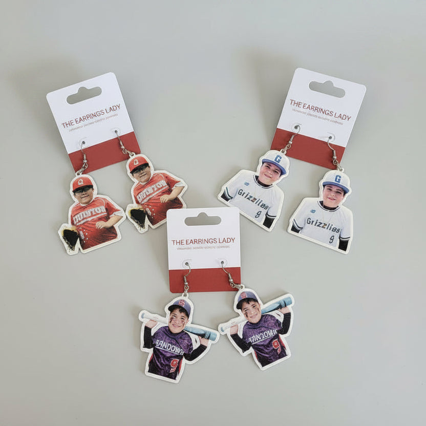 A product listing screenshot showing custom Little League earrings with player cutouts on a wooden surface, plus a review section below with text and buttons.